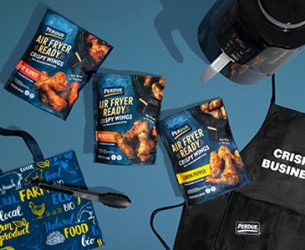 The Ultimate at Home Wing Kit includes a package of each new wing flavor, a four-quart air fryer, a&ldquo;Crispy Business&rdquo; apron, one pair of tongs, a tote bag, and a coupon redeemable at participating retailers.