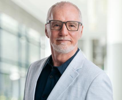 A photograph of Perry Aulie, President of Perdue Agribusiness