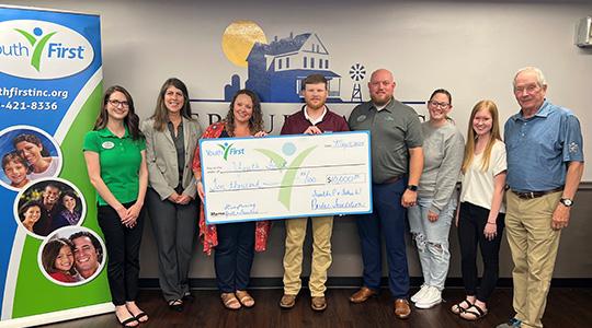 Left to right are Elspeth Urbina, Major Gifts Officer, Youth First, Inc., Julie Hoon, VP of Marketing & Communications, Youth First, Inc., Sara Norfolk, Area HR Manager, Perdue Foods, Chad Warden, Sr. Plant Manager, Perdue Foods, Jeremy Adams, Regional Development Officer, Youth First, Inc., Krissy Melhiser, MSW, LCSW, Youth First Social Worker at Washington Jr. High School, Leah Lottes, MSW, LCSW, Youth First Social Worker at Barr-Reeve Elementary and Barr-Reeve Middle/High School, and Dr. Bill Wooten, You