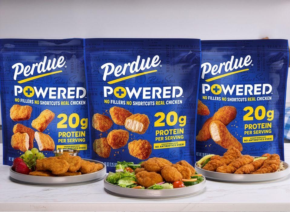 Three Perdue Powered chicken product packages with orange packaging and visible nutritional information displayed side by side.